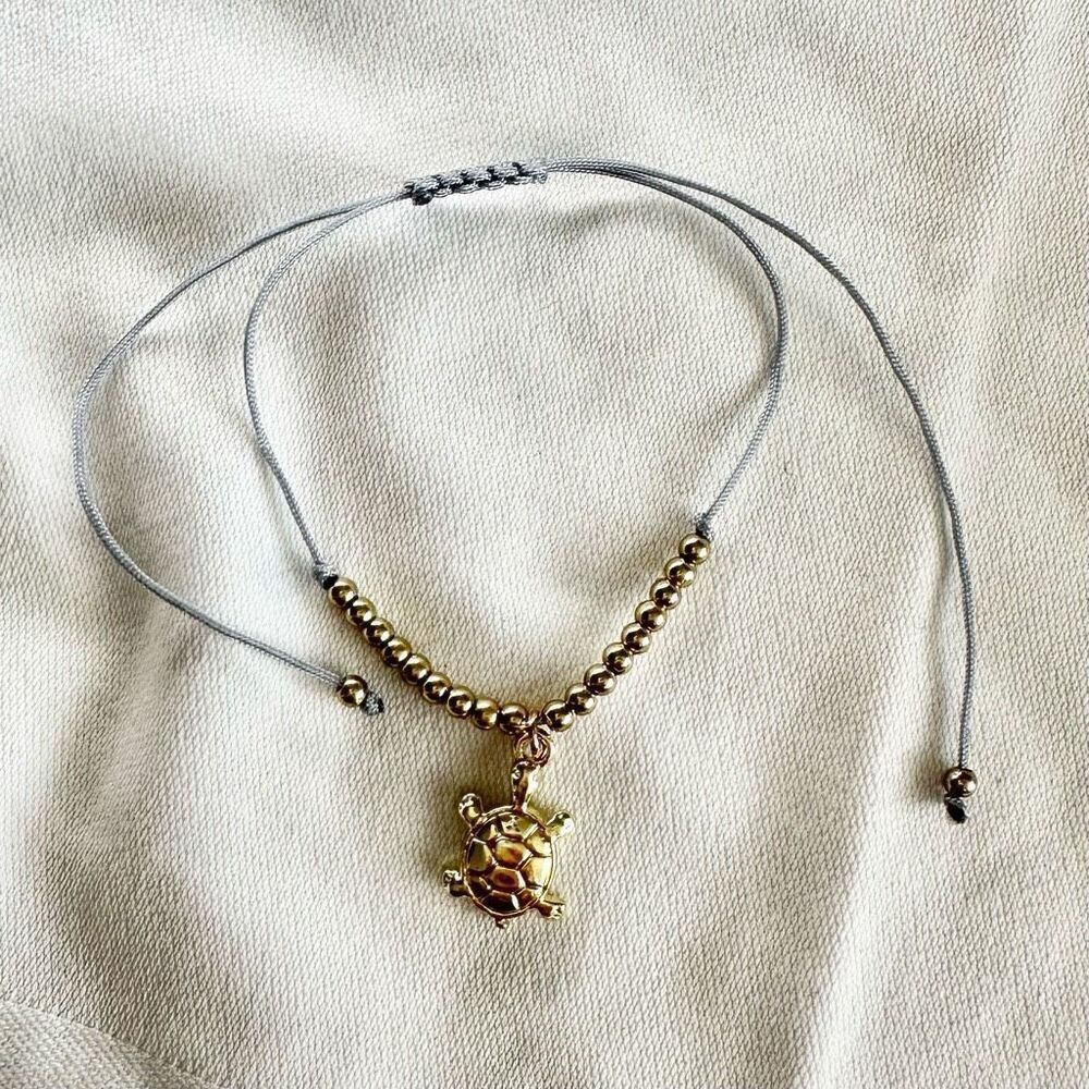 Gold and grey turtle friendship bracelet